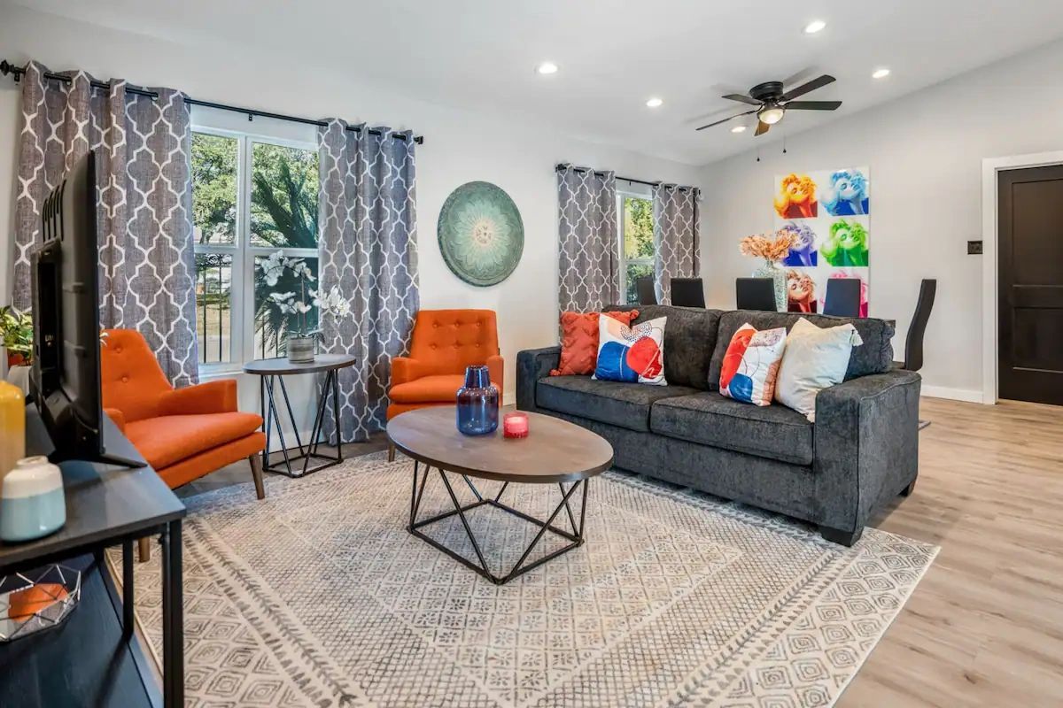 Vibrant hues dance harmoniously in this Airbnb's interior, creating a kaleidoscopic haven that exudes warmth, personality, and an unmistakable sense of joy.